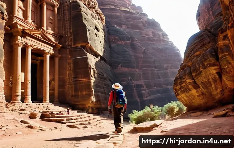 요르단의 유명한 산책로 - **Petra's Hidden Grandeur: The Ad Deir Monastery Trail**
    A lone male trekker, dressed in appropr...